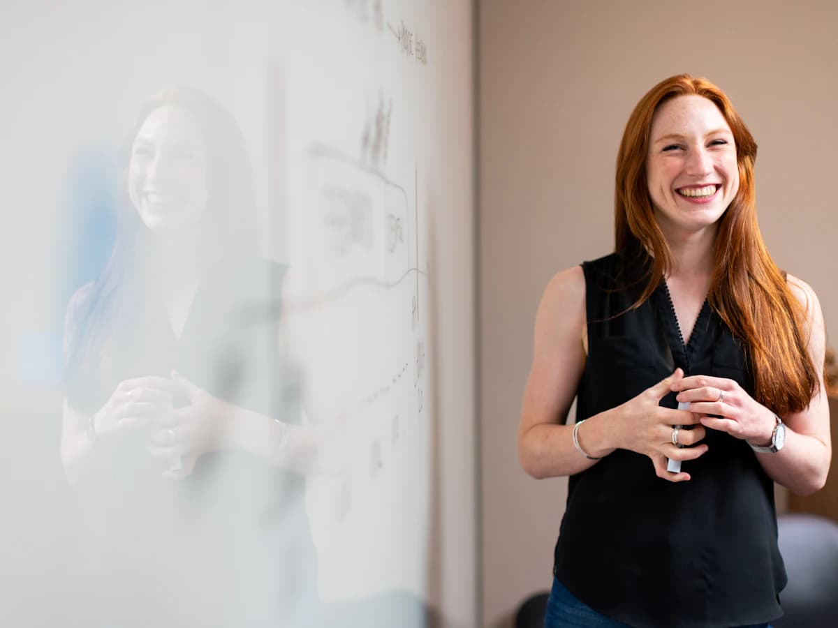 Planning lead presenting at a whiteboard